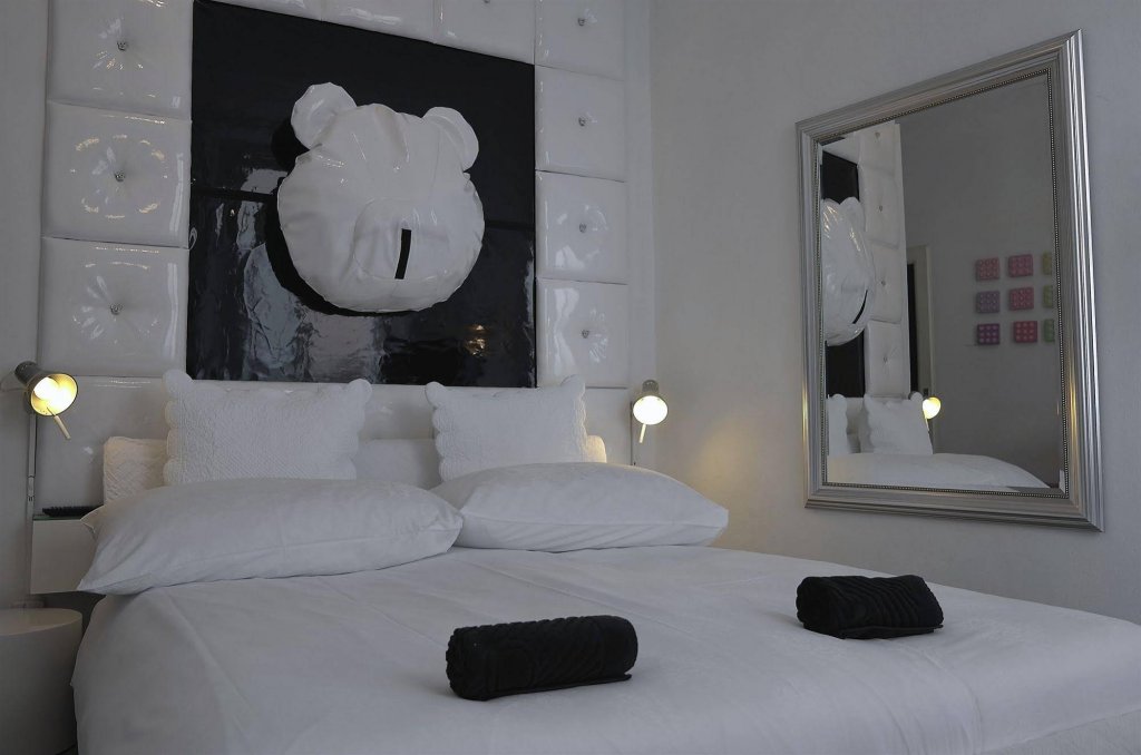 Фото Caffè dell'Arte Boutique Rooms