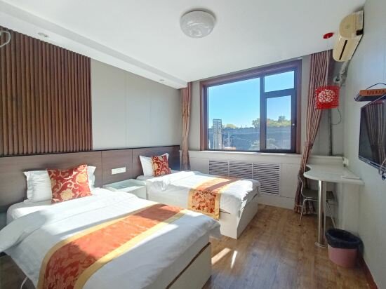 Фото Qufu International Youth Hostel