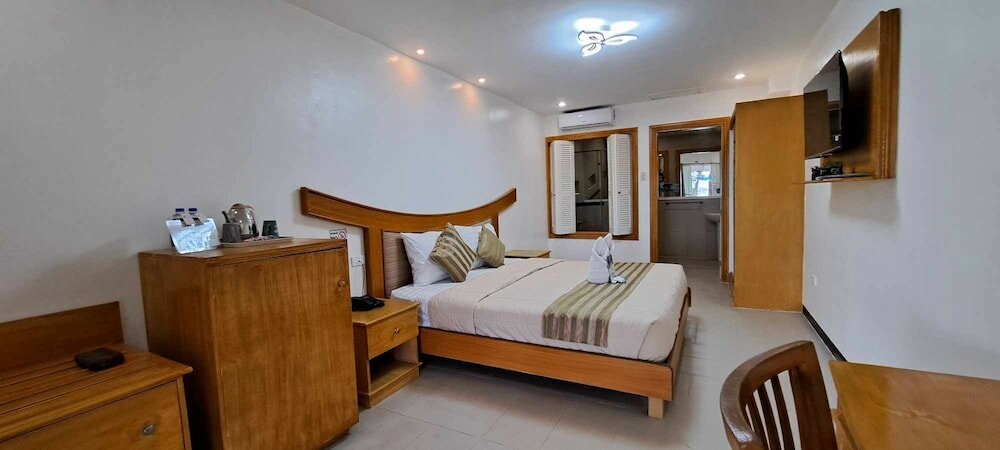 Фото Wild Orchid Beach Resort