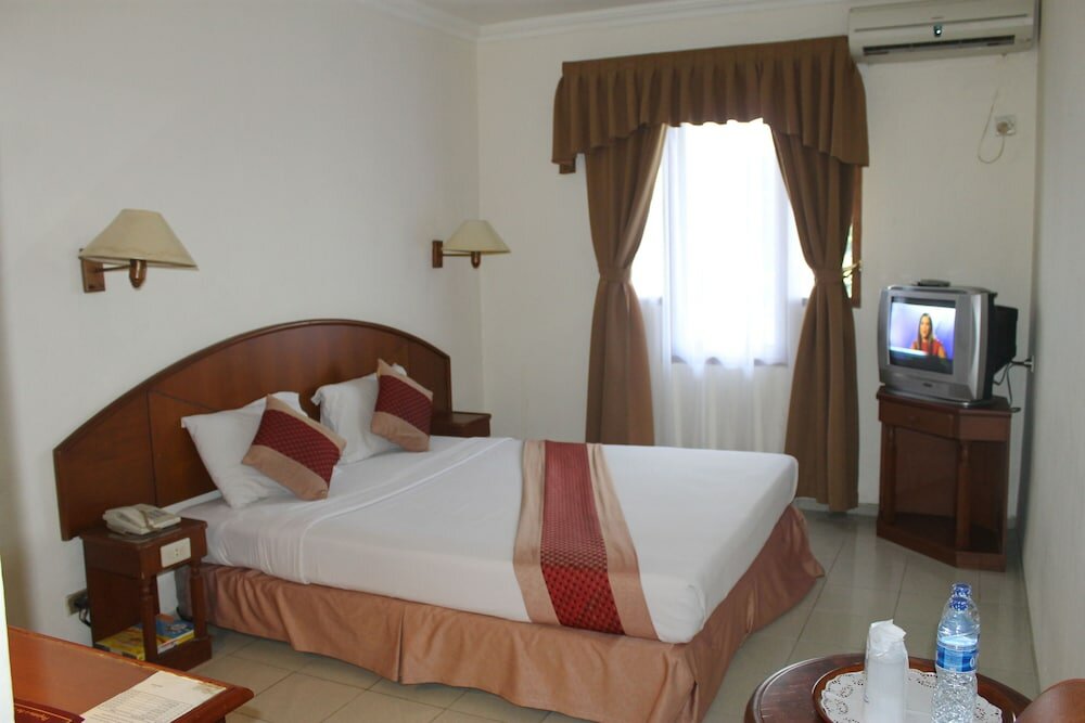 Фото Mega Matra Hotel