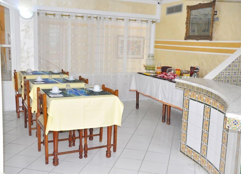 Фото Hôtel Les Palmes d'Or