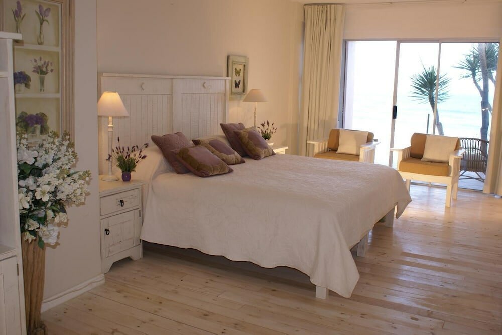 Фото The Pink Lodge on the Beach