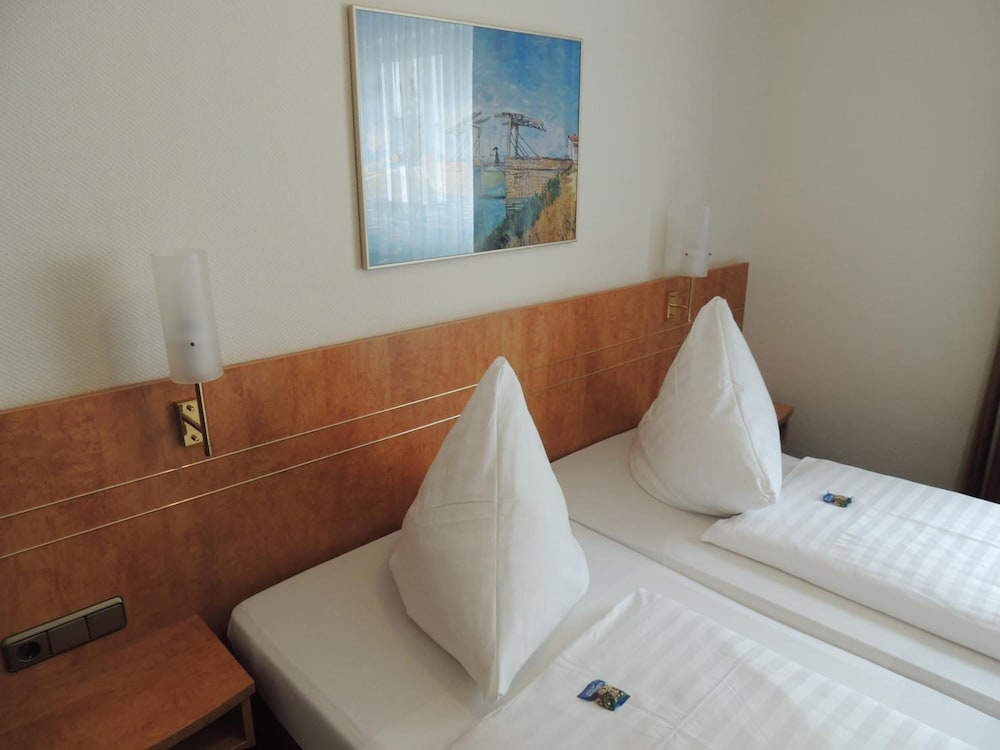 Фото Airport Businesshotel Koeln