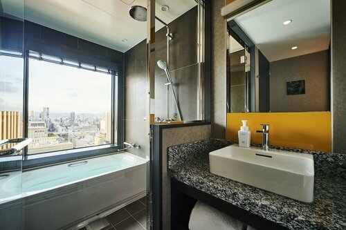 Гостиница The Royal Park Hotel Iconic Osaka Midosuji в Осаке