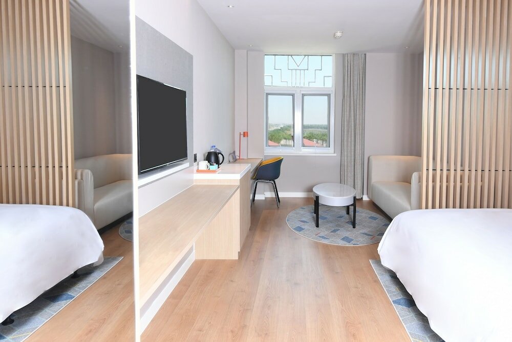 Фото Holiday Inn Express Tianjin Binhai, an Ihg Hotel