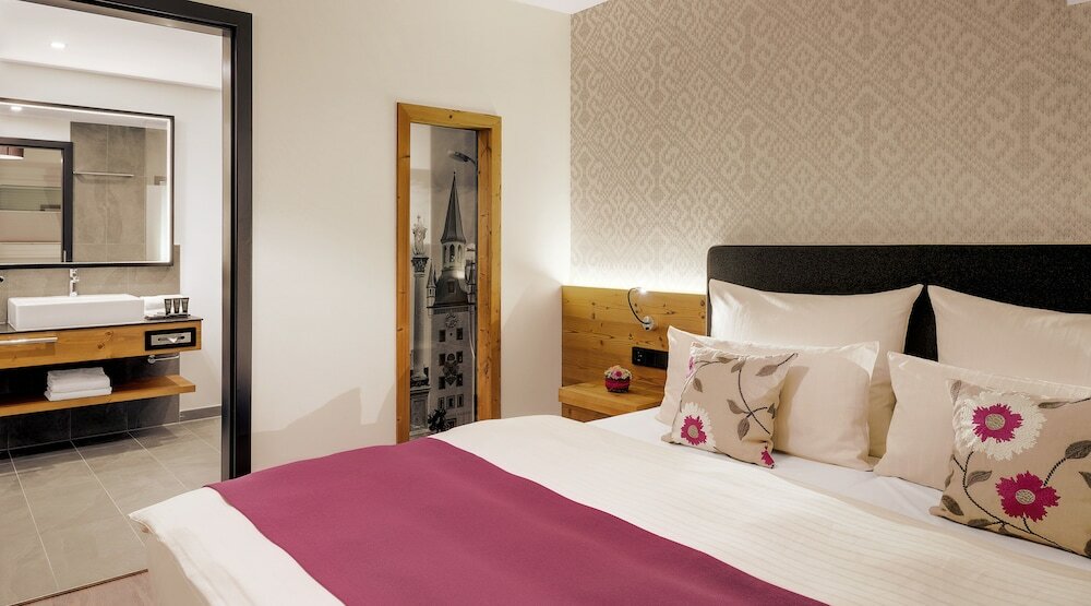 Фото Alpen Hotel München