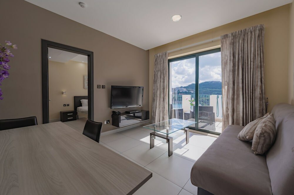 Фото Porto Azzurro Aparthotel