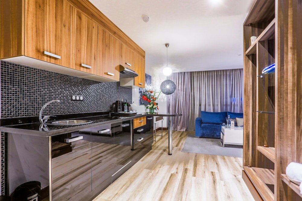 Фото Sbn Suites Hotel