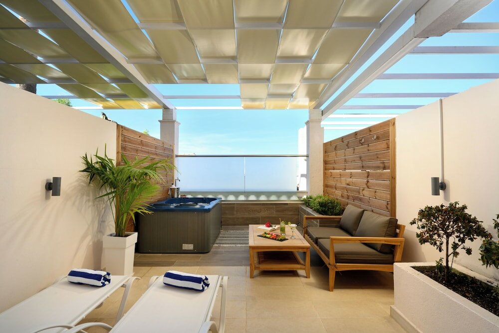 Фото Cavomarina Beach-Adults Only