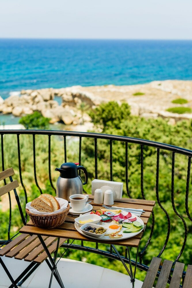 Фото Olivia Palm Hotel