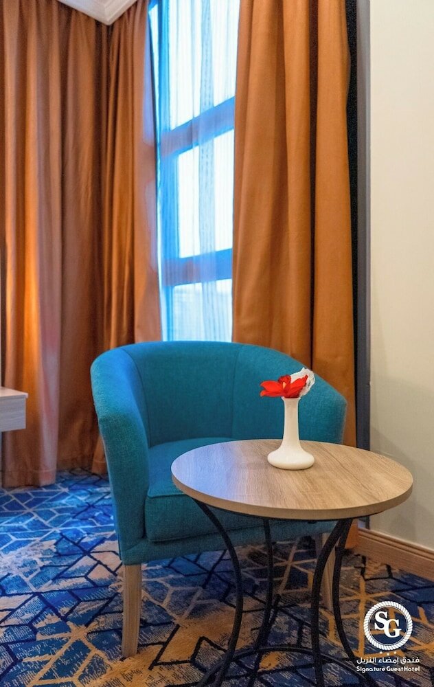 Фото Signature Guest Hotel