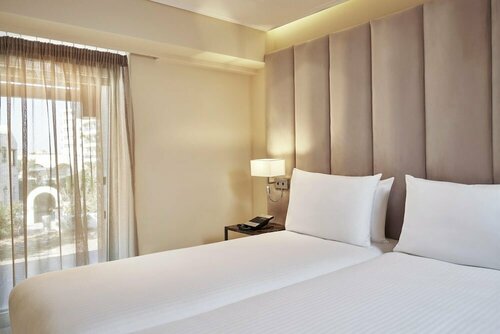 Внешний вид отеля Bellevue On The Beach Suites в Муниципальной единице Родосе, фото 3