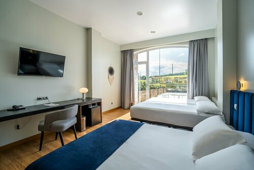 Гостиница Abba Comillas Golf Apartments в Комилласе
