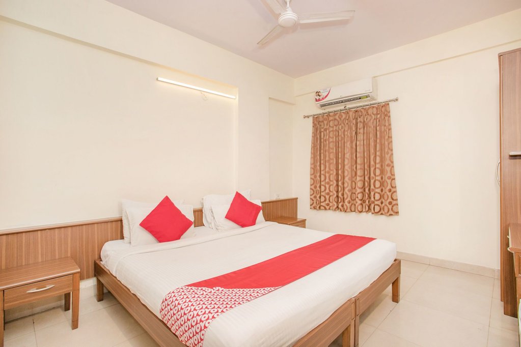 Фото Oyo 7669 The Trinitywood Hotel