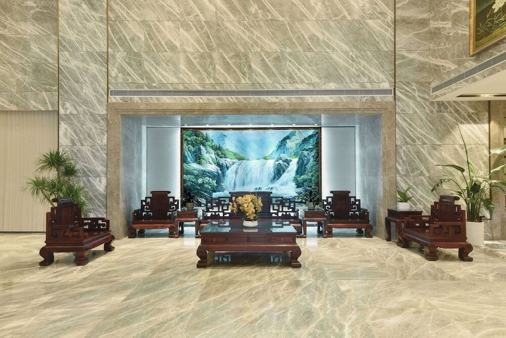 Фото Ramada Plaza Dongxing City Center