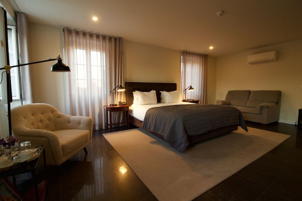 Фото Paço do Bispo Boutique House