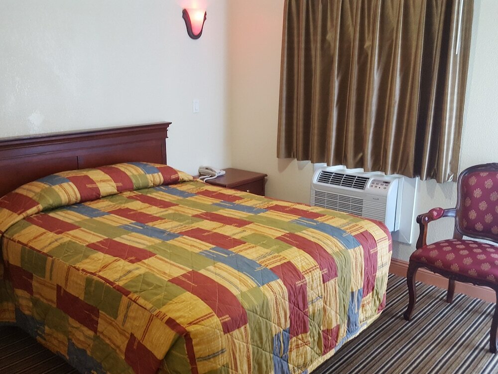 Фото Travel Inn Motel