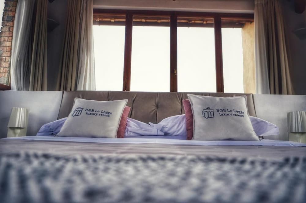 Фото B&b Le Logge Luxury Rooms