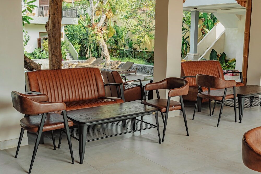 Фото Putri Ayu Cottages