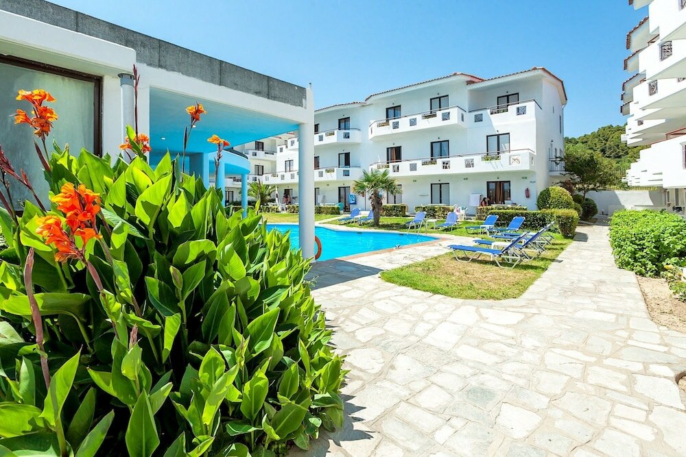 Фото Xenios Dolphin Beach Hotel