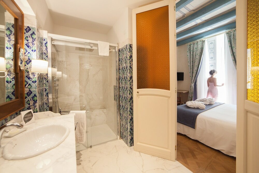 Фото Algila' Ortigia Charme Hotel