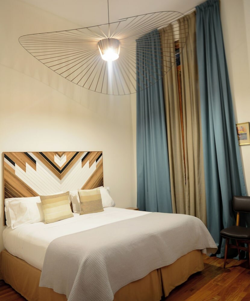 Фото L'Adresse Hotel Boutique