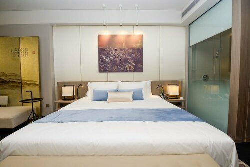 Внешний вид отеля Golden Tulip Bund New Asia в Хункоу, фото 4