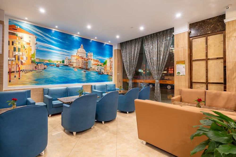 Фото Yiwu Baide Theme Hotel