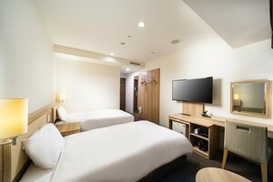 Гостиница Koko Hotel Sapporo Ekimae