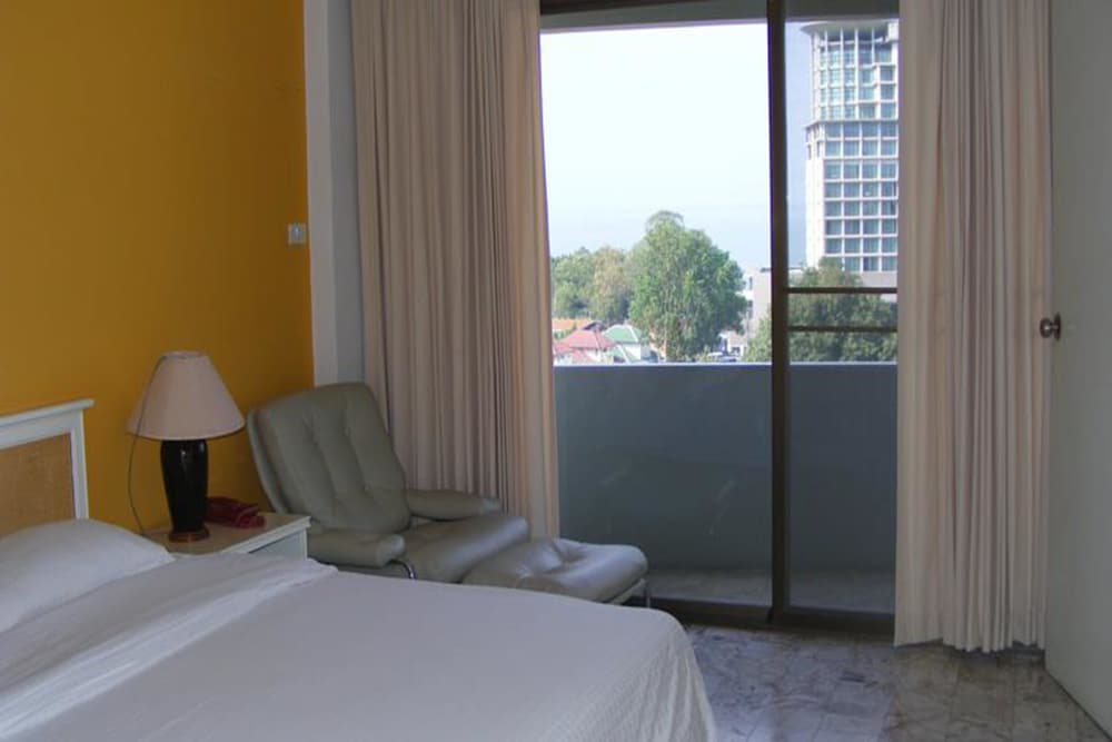 Фото Garden Paradise Hotel & Serviced Apartment