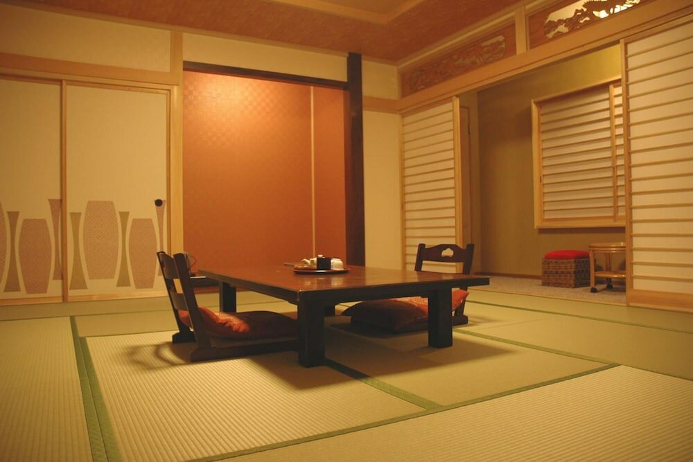 Фото Kusatsu Onsen Kiyoshigekan