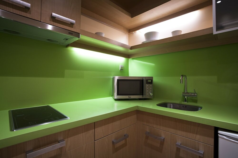 Фото Suites Gran VIA 44 Apartahotel