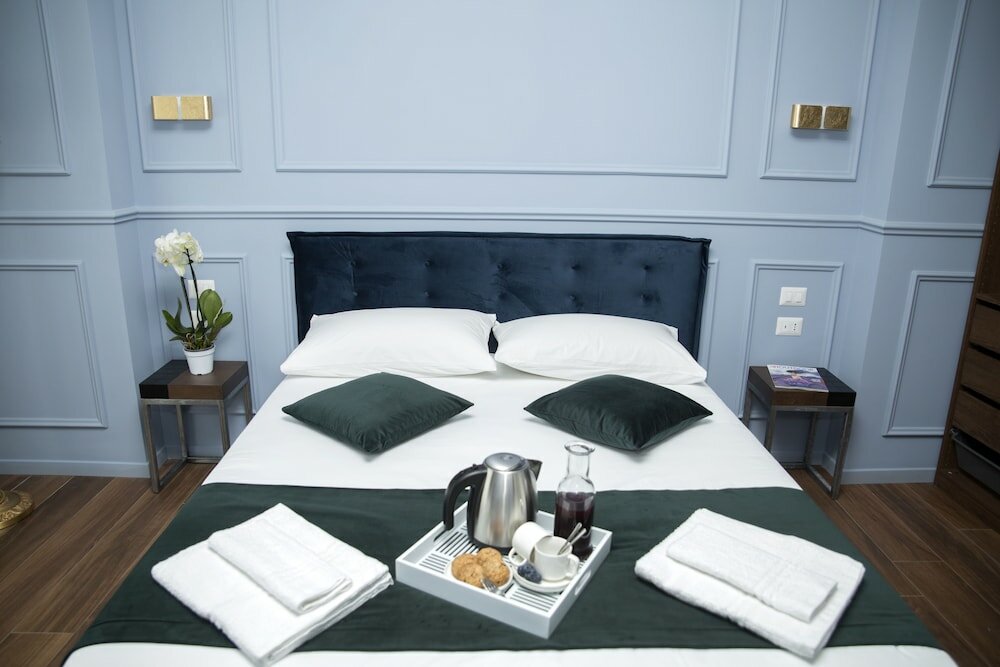 Фото Unicum Roma Suites