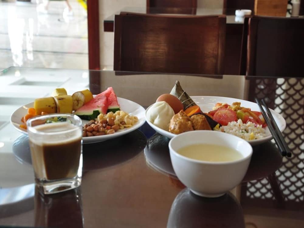 Фото GreenTree Inn Taizhou Taixing East Guoqing Road Rt Mart Business Hotel