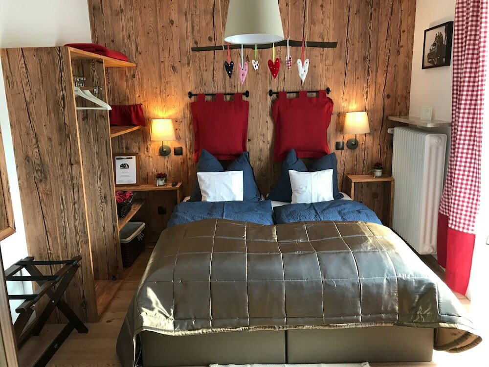 Фото Hotel Garni Haus Alpine