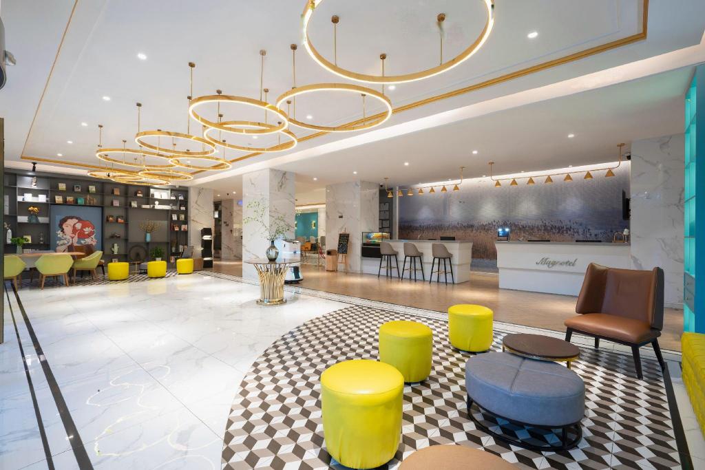 Фото Magnotel Jining Jiaxiang, Zengzi Avenue Hotel