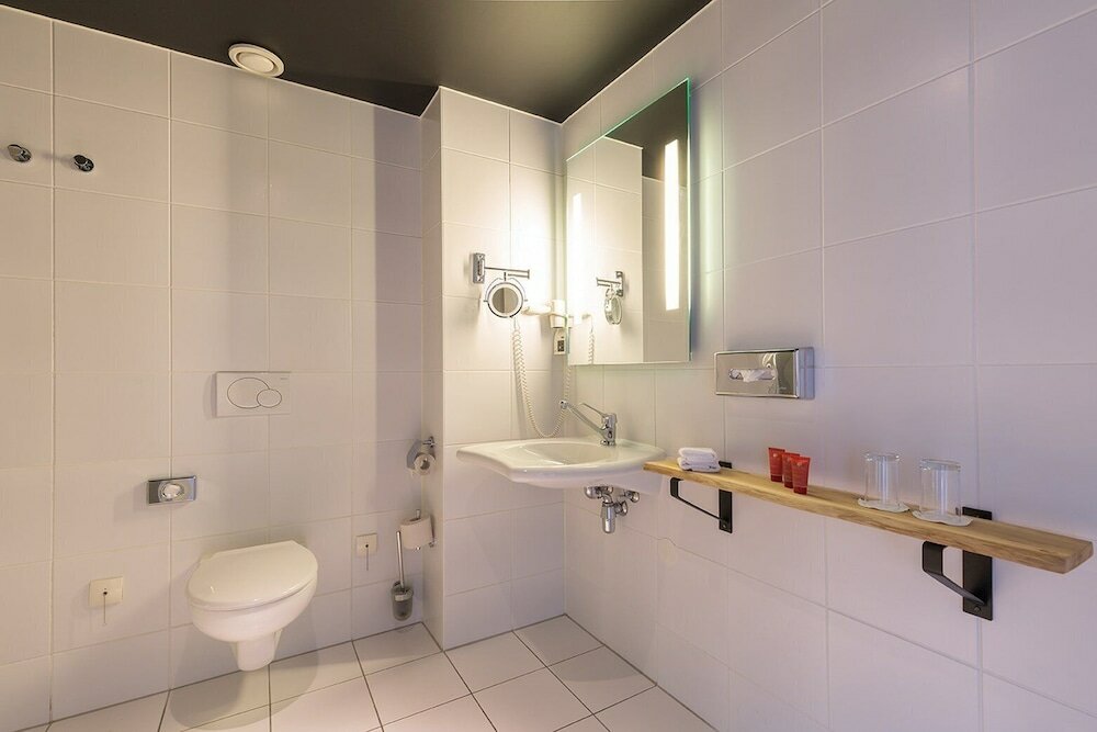 Фото Leonardo Hotel Almere City Center