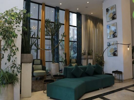 Фото The Row Residential Hotel