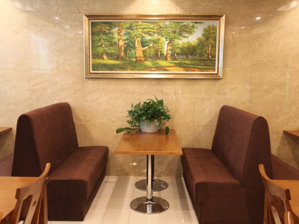 Фото Vatica ZaoZhuang TengZhou Railway Station Hotel