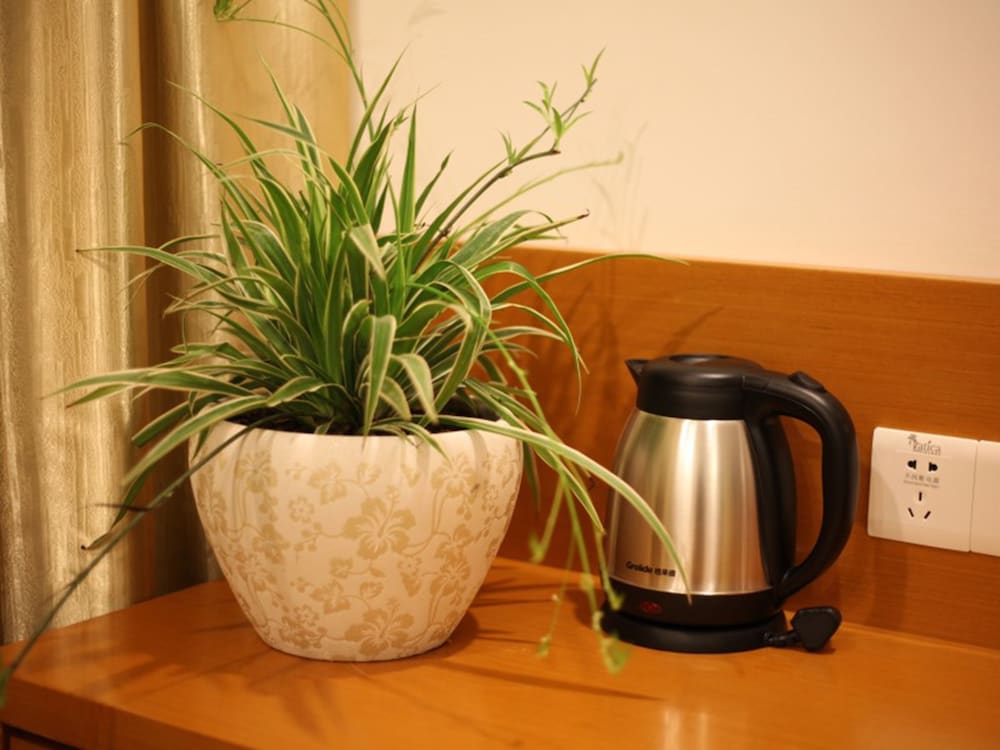 Фото Vatica ZaoZhuang TengZhou Railway Station Hotel