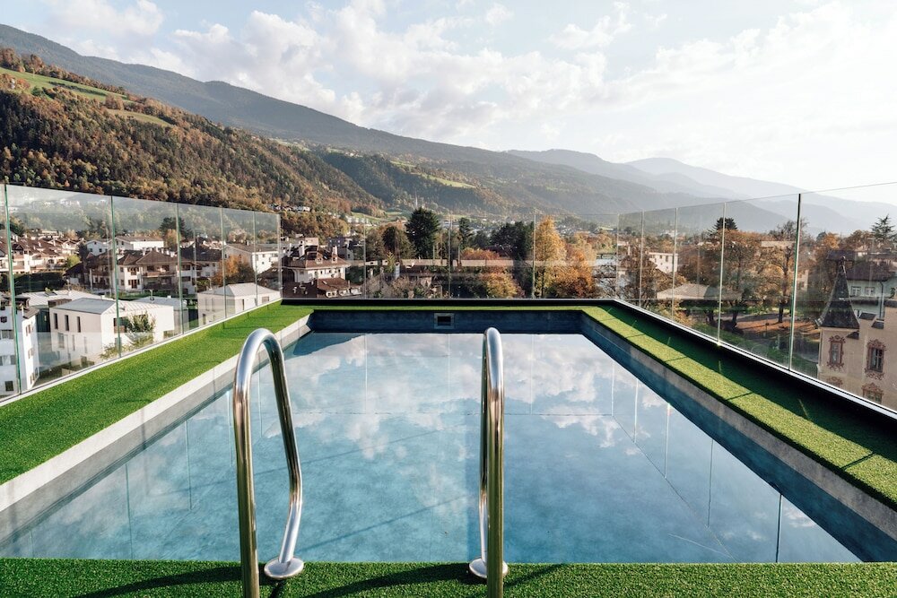 Фото Alpine City Wellness Hotel Dominik