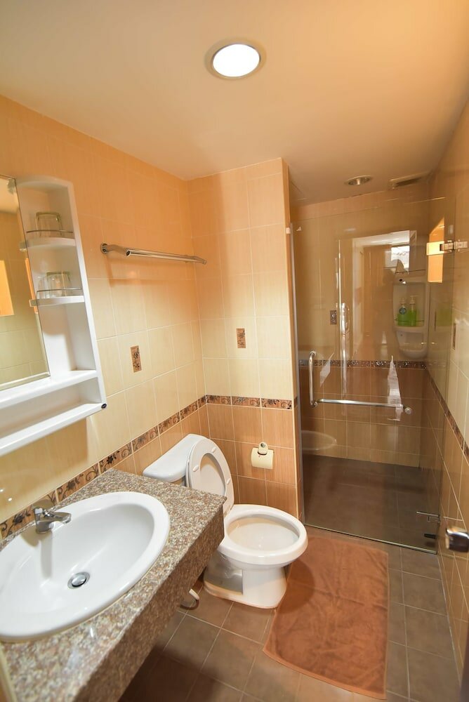 Фото Eight Ville Apartment