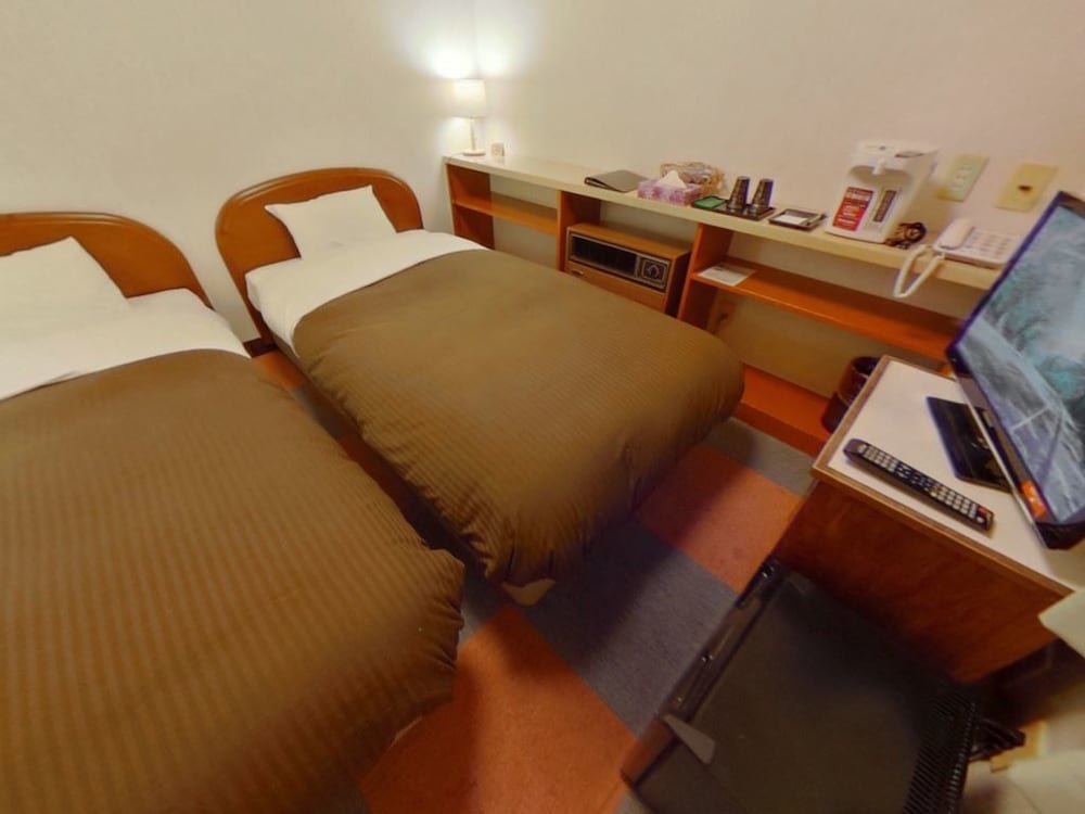 Фото Shirakawa Business Hotel