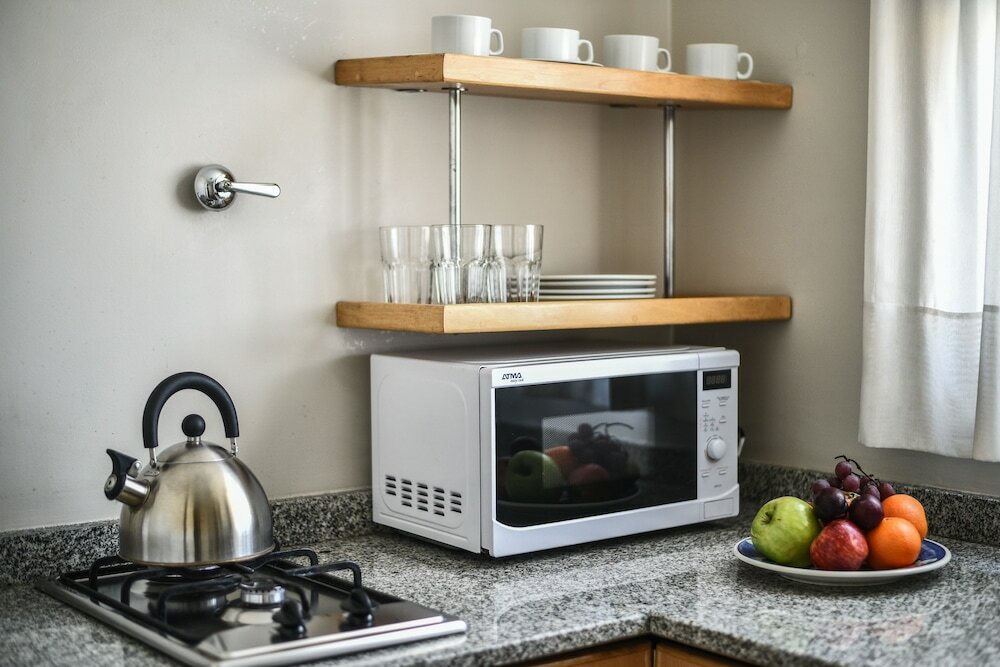 Фото Portal Plaza Suites