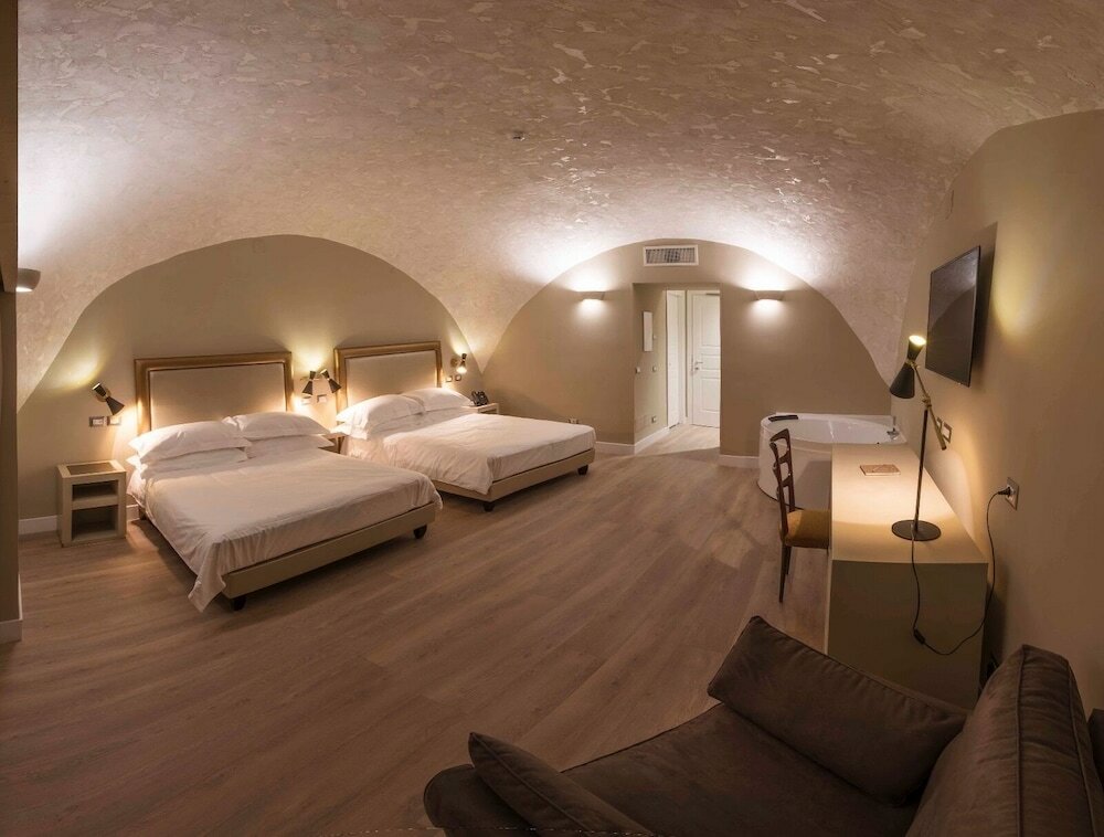 Фото Caruso Place Boutique & Wellness Suites