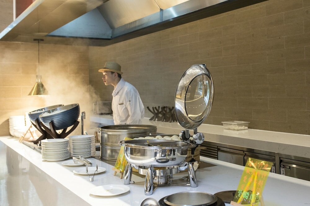 Фото Q-Box Hotel Shanghai Sanjiagang