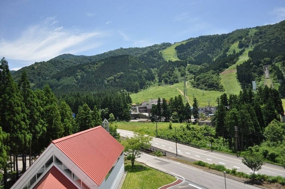 Фото Tateyama Kokusai Hotel