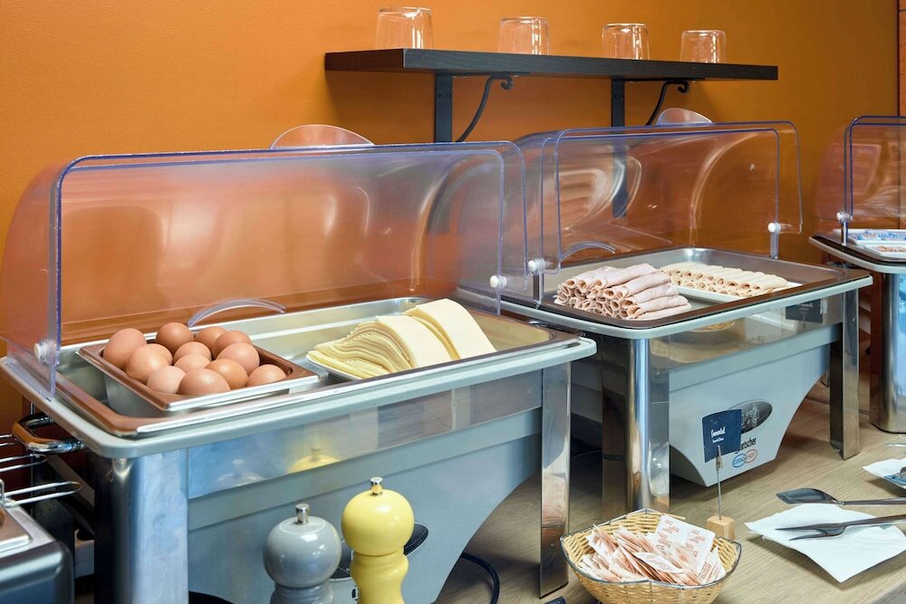 Фото Comfort Aparthotel Versailles Saint Cyr Lecole 