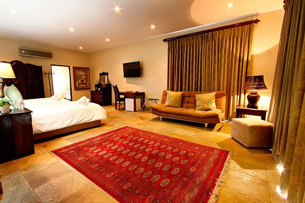 Фото Afrique Boutique Hotel Ruimsig