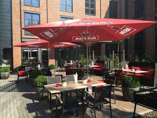 Внешний вид отеля Altes Stahlwerk в Ноймюнстере, фото 3